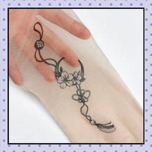 Collant effet tatouage tattoo tights motif fleurs de cerisiers