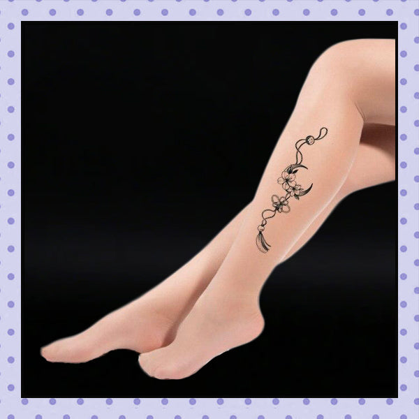 Collant effet tatouage tattoo tights motif fleurs de cerisiers